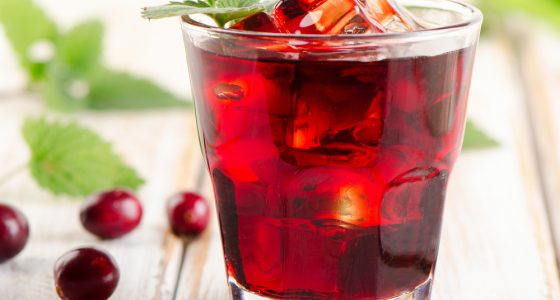 Cranberry,Cocktail,With,Mint,On,A,White,Wooden,Table.,Selective
