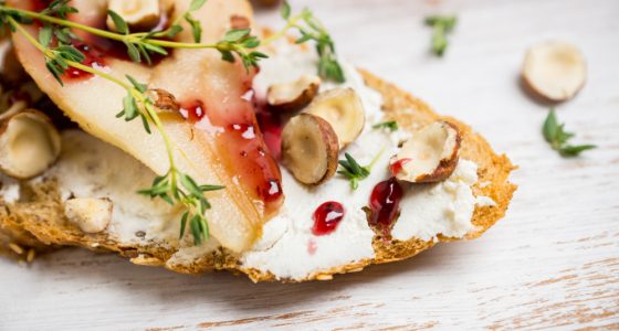 Bread,With,Ricotta,Cheese,And,Pears,On,The,Wooden,Background.