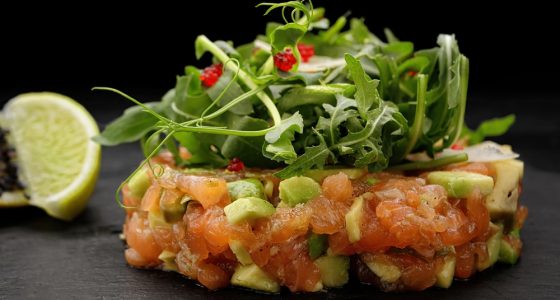 Salmon,Tartar,With,Avocado,And,Arugula